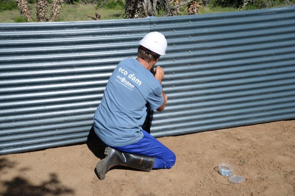 4. bolt together the eco dam sheeting 2