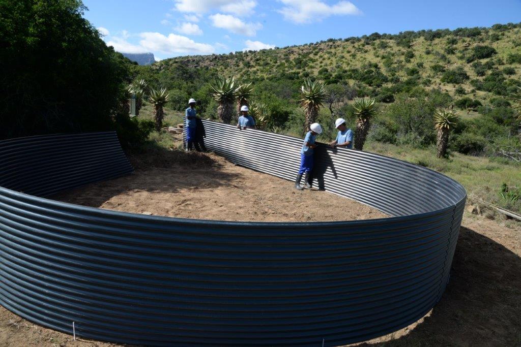 4. bolt together the eco dam sheeting 4