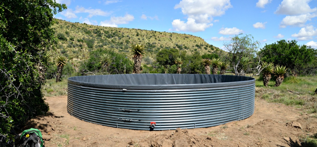 an eco dam that was installed on a piece of land that was cleared for it, sans water